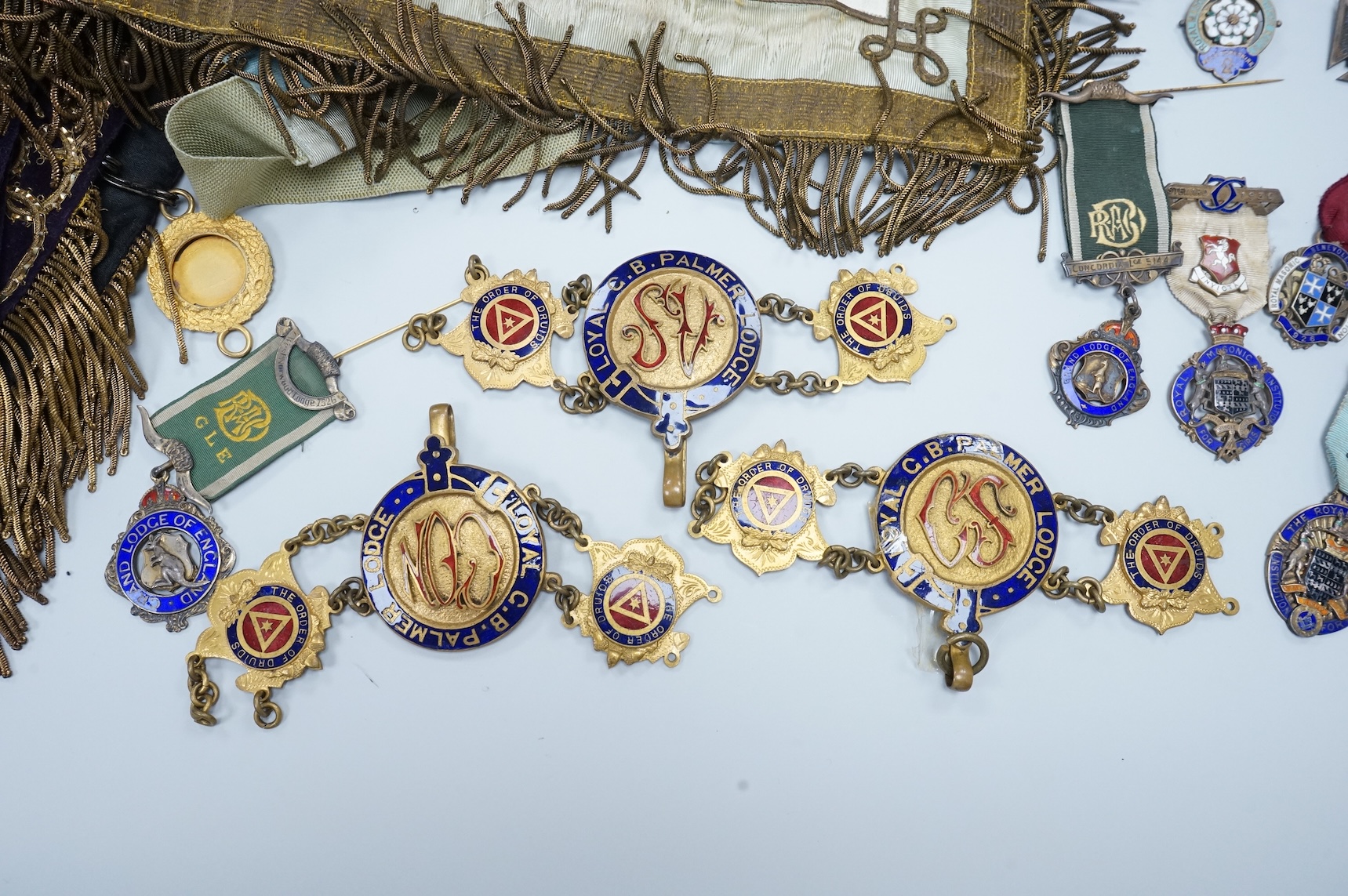 A group of Masonic medals, ‘jewels’ many enamelled and sashes, together with an early 19th century certificate